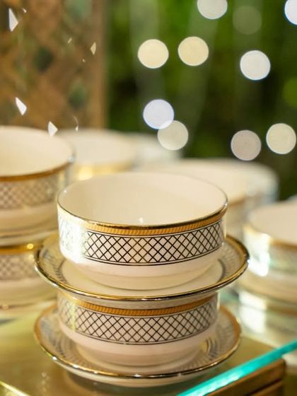 A close-up of the fine bone china we provide. We offer a selection of luxury tableware, and clients can even choose their plates to perfectly match their event's aesthetic.