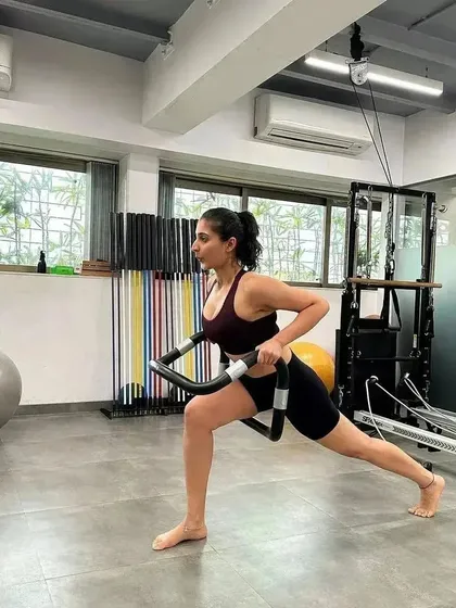 A shot of a client using the CoreAlign, a unique piece of equipment that improves posture, balance, and functional movement. We incorporate a variety of tools to keep workouts challenging and effective.