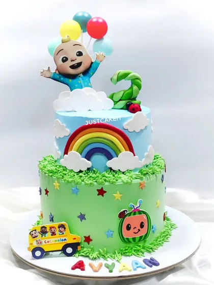 A two-tier Cocomelon cake that is bright, cheerful, and full of fun details like the school bus and rainbow. This sturdy cake travelled all the way to Dombivli perfectly intact.
