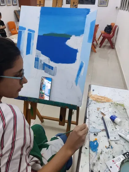 A series of images showing the progression of an acrylic seascape painting, from the initial blocking of colors to the addition of fine details.