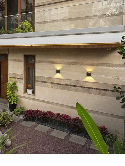 The ground floor of this modern home features a small, intimate garden space, demonstrating our belief that even small pockets of nature can enhance the living experience.