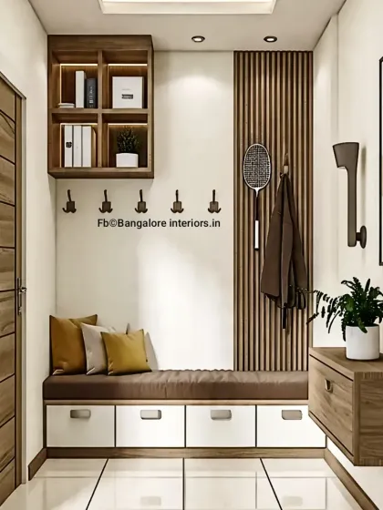 A practical and stylish entryway unit with a cushioned bench and storage drawers below. The design includes coat hooks and overhead shelving, ensuring everything you need when leaving the house is in one place.
