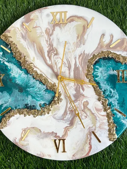 A unique geode design combining teal and earthy tones. I love seeing students experiment with different color palettes to match their personal style.