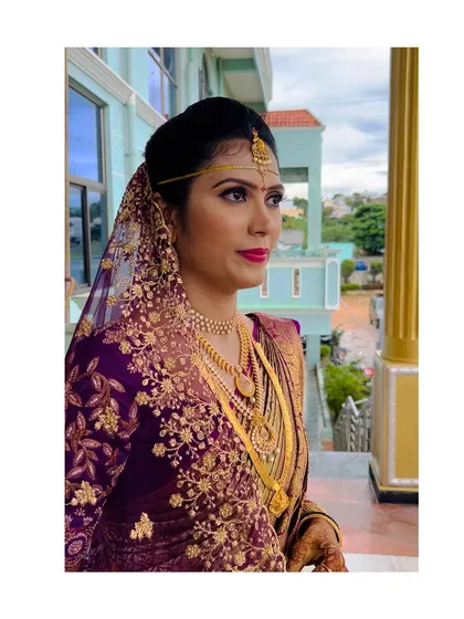 A close up of the bride's muhurtham makeup. I used warm tones and a classic pink lip to create a look that is both traditional and fresh.