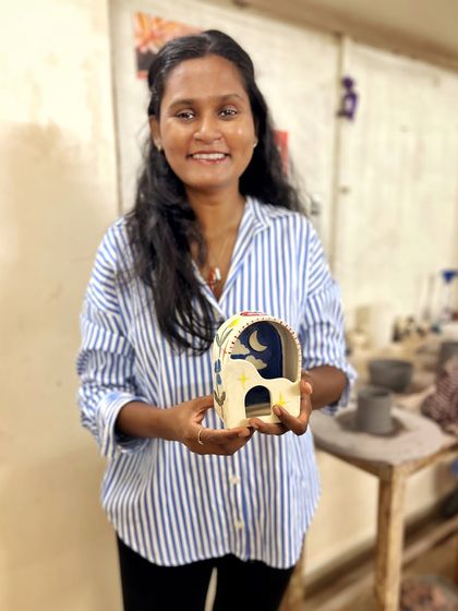 Exploring all four techniques, this student created a whimsical collection in her beginner's course, including a night-sky luminary, a cupcake jar, and a mug with a face.