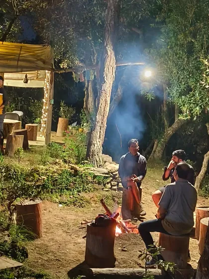 The adventure doesn't end when the sun goes down. Evenings at our Mukteshwar campsite are for sharing stories, relaxing by the bonfire, and becoming part of the WTH community. This is where friendships are forged.