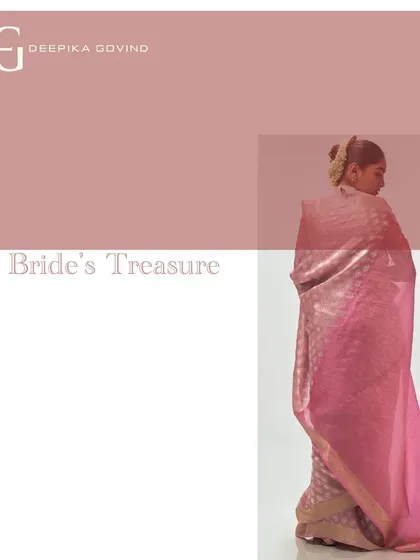 The back view of the 'Ashes of Roses' saree shows the flow of the fabric and the rich color of the pallu. It is a piece that feels both timeless and contemporary.