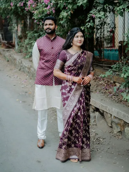 A classic portrait of the engaged couple in their coordinated outfits, perfect for "save the date" announcements.