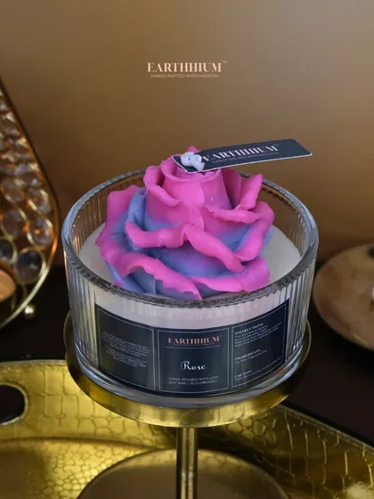 A two-toned rose votive, blending pink and purple for a unique and beautiful effect.