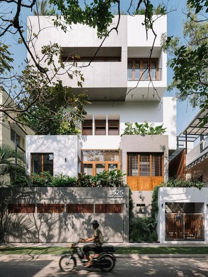 The 'House of the Hanging Gardens' is a multi-story urban home where greenery is integrated at every level, creating a vertical oasis.