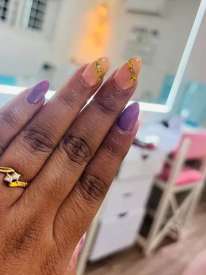 Another view of these lovely purple and peach birthday nails, showing how the colors work together.