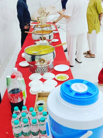 A simple buffet spread for a full-day catering event, featuring fresh rotis, curries, and other essentials to provide a wholesome and satisfying meal.