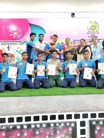 The senior boys team receiving their trophy and certificates for winning the Inter-House tournament.