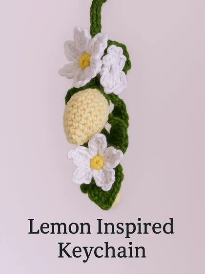 This lemon-inspired keychain is so fresh and zesty. The little lemons and white blossoms create a beautiful, delicate design.