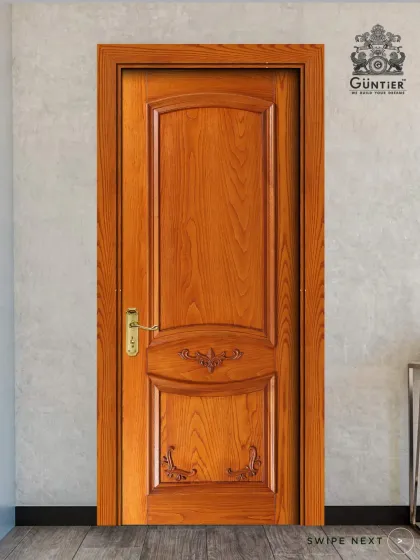 For those who appreciate classic elegance, this solid wood door with ornate carvings and a natural polish is a timeless choice. The detailed craftsmanship on the panels adds a touch of heritage and sophistication.
