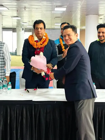 Receiving a welcome from an official at the Delhi State selection trials. We work closely with school sports federations to promote karate.