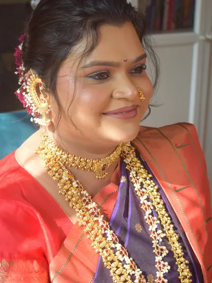 A sun-kissed, happy portrait of the bride, her skin glowing and her smile infectious.