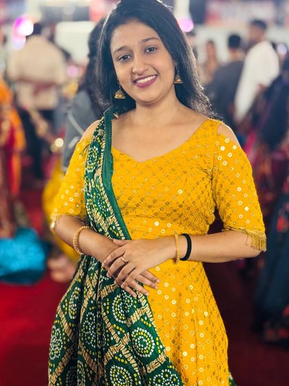 This yellow outfit is perfect for dancing the night away during Garba. It's light, comfortable, and stylish.