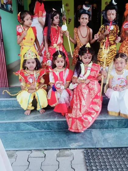 I love seeing a whole group ready for their performance. This picture shows a variety of my mythological costumes, including Ram, Durga, and Shiva, all together for a school's annual function.