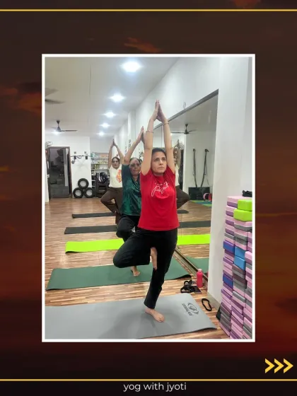 A student holding a strong and steady Tree Pose, a testament to her consistent practice.