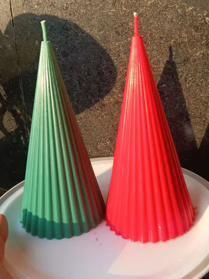 A bright shot of the Christmas cone candles against a sunny background.