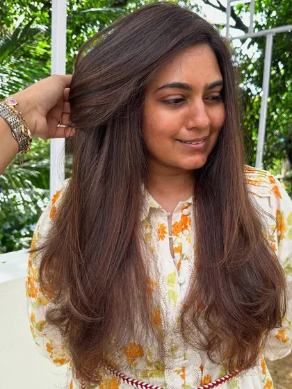 Are you even birthday ready if your hair ain’t done? This transformation involved covering significant grey regrowth and blending it into a rich, youthful brunette color with a fresh cut.