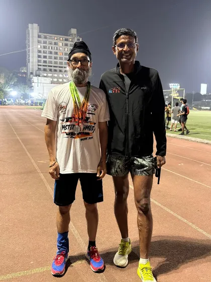 Coach Brinston with athlete Satinder Singh after his multi-medal performance at the masters state event. We train athletes for track and field events, not just road races.