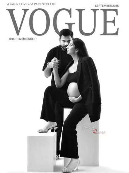 A creative, magazine-style couple's portrait designed to look like a Vogue cover. This black and white shot captures the modern, chic style we can achieve for parents-to-be who want something unique.