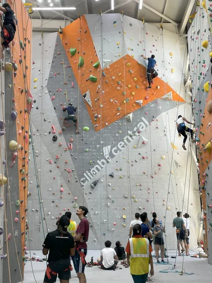 Our gym on a busy day, with ropes crisscrossing as multiple teams climb at once. The energy is contagious.