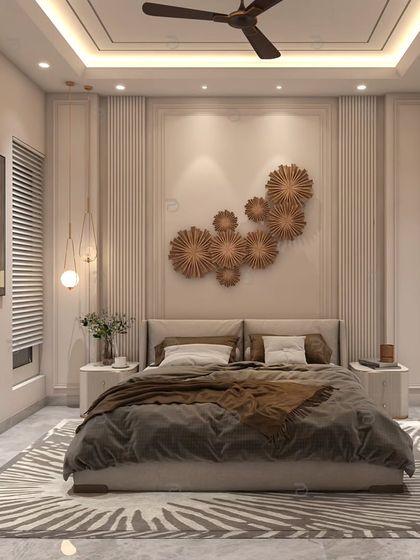 This bedroom combines a neutral palette with striking details, including a metallic floral art installation above the bed and a zebra-print rug for a touch of glamour.