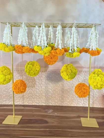 This is a great example of modern Indian decor. The clean lines of the golden frame contrast beautifully with the traditional floral elements.