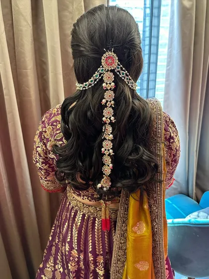 The right hair accessory can elevate an entire look. I love incorporating unique pieces like this intricate pearl and stone chain to add a touch of royal elegance to a classic half-up hairstyle.