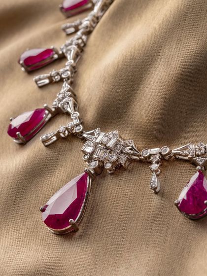 A closer look at the Scarlet Royale necklace, where each ruby drop is articulated to move gracefully.