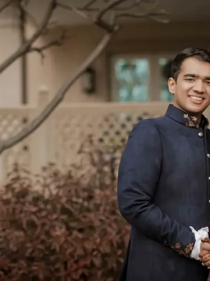 A classic portrait of Deepali and Anmol at the ITC Grand Bharat. Their formal attire and the luxurious setting combine for a truly elegant and timeless photograph.
