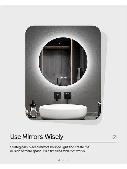 Use mirrors wisely. A strategically placed mirror, like this backlit one in a bathroom, bounces light and creates the illusion of more space.