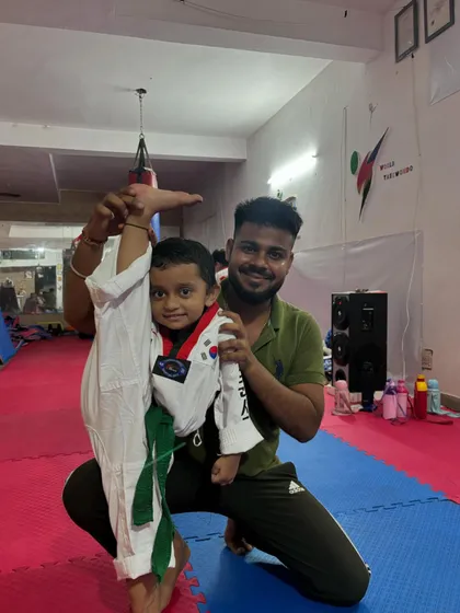 Even the smallest champions can have the biggest spirit. Here, I am helping a three year old student with her flexibility and kicks. My academy is a place for everyone, starting from age 3, to grow strong.