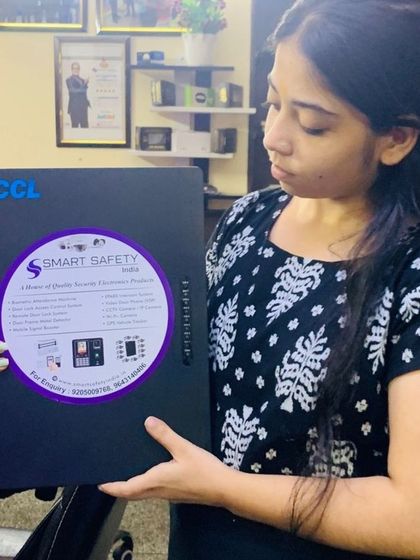 A team member inspecting the EPABX unit before it's packed for a client. We check every product to ensure it meets our quality standards.