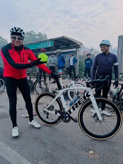 A fellow member admiring the new Trek Madone. We share in each other's excitement.