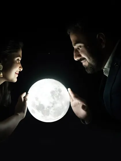 A creative night shot using a moon prop to create a magical and dreamy atmosphere. We have unique props like this to help you bring your most imaginative photo ideas to life.