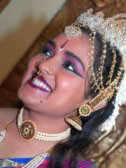 A close-up of a Bharatanatyam dancer, capturing the intense emotion and intricate details of her makeup and costume. My performance arts photography aims to freeze the grace and expression of the artist in every shot.
