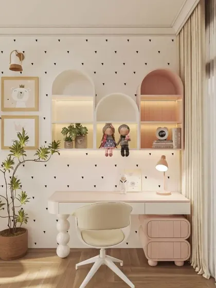 This bright and airy study space for a child's room features arched, back-lit shelving nooks and a simple white desk. The design is both playful and organized.