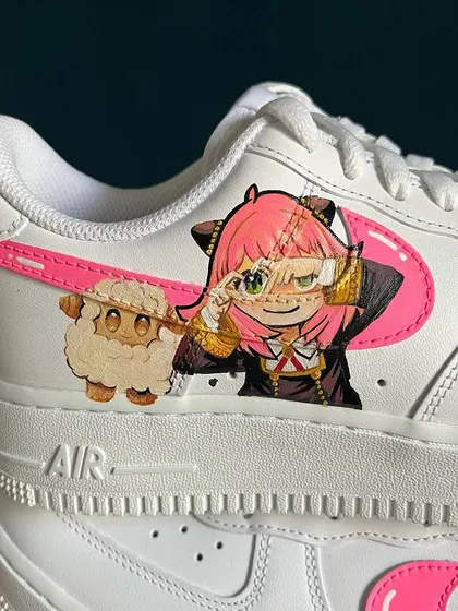 The cutest spy, Anya Forger from SPY x FAMILY, on a pair of custom Nike AF1s. The tiny details on her face and her little sheep companion were so fun to paint.