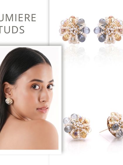 The Lumiere Studs combine grey, beige, and white beads for a sophisticated and versatile piece of earwear.