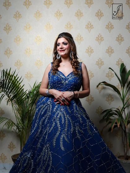 A three-quarter shot that allows for a closer look at the gown's bodice and the model's styling.