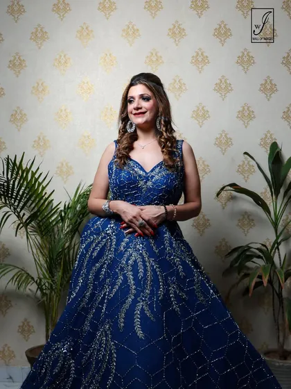A three-quarter shot that allows for a closer look at the gown's bodice and the model's styling.