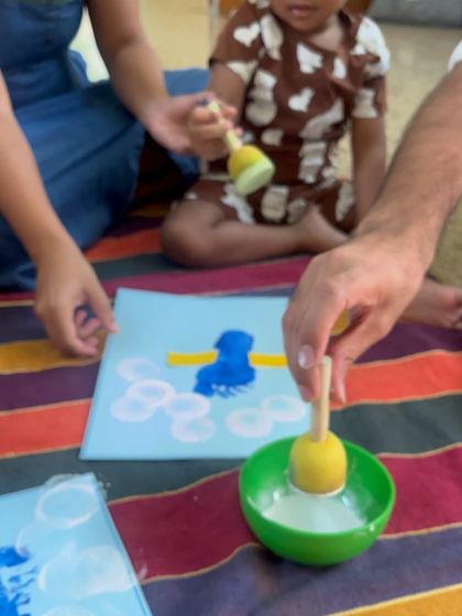 Using tools like sponge dabbers helps toddlers practice their grip and control, which are important pre-writing skills. It's a fun way to paint without the pressure of holding a brush.