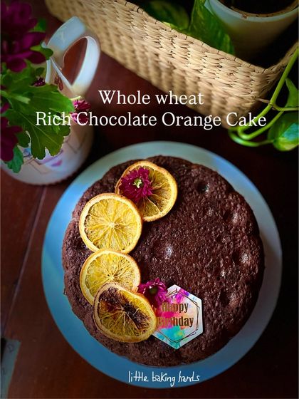 A beautiful rich chocolate orange cake made with whole wheat flour. The combination of dark chocolate and bright citrus is a classic for a reason, and it makes for a wonderful birthday celebration cake.