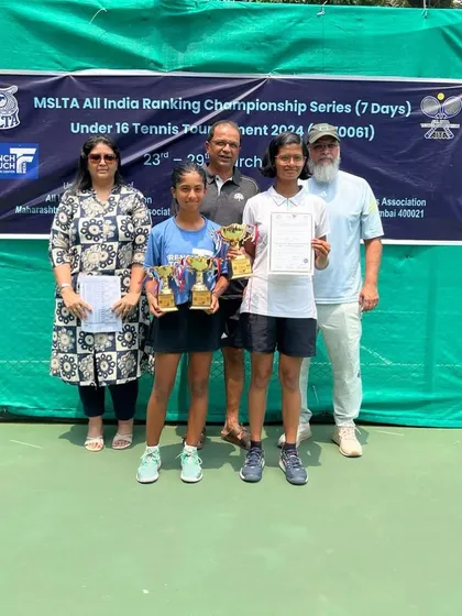Our players and their families celebrating success together. Eshal Pathan, a finalist in Singles and winner in Doubles at the All India U16 Championship Series, pictured with her family and coach.