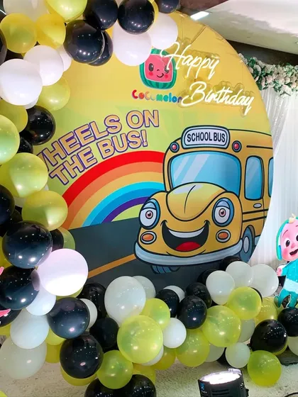 A closer look at the Cocomelon birthday backdrop. The vibrant print and cheerful characters are perfect for a toddler's party.