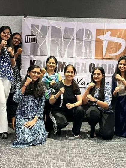 A group of empowered women after a self-defense workshop for a global financial information and news platform. The training provides practical tools for personal safety in daily life.